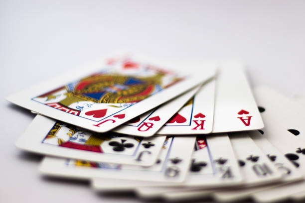 Mobile phone displaying deposit 5k live blackjack table with dealer and chat interface